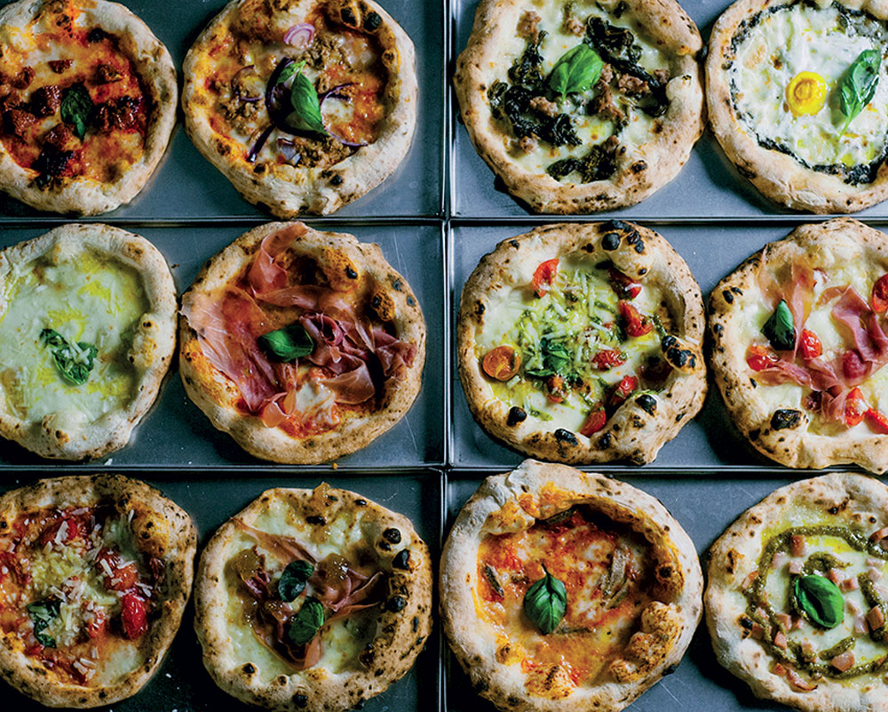 La pizza si mangia in modo social: la rivoluzione di Briscola Pizza Society