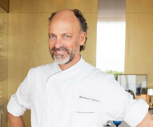 Ritratto dello chef Moreno Cedroni, sostenitore di Too Good To Go contro lo spreco alimentare.