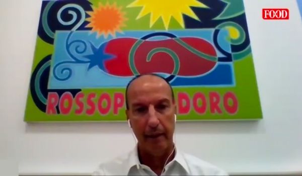 Roberto Colombo (Sebeto) e il futuro del food made in Italy. Logo Rossopomodoro sullo sfondo.