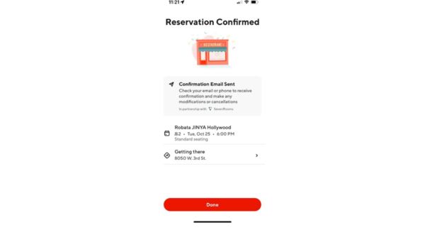 Screenshot DoorDash: prenotazione ristorante confermata. Servizio prenotazioni DoorDash.