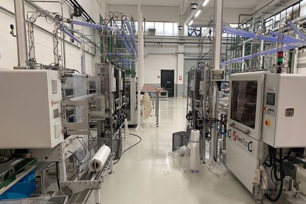 Nuovo impianto Flo per produzione bicchieri carta. Macchinari industriali moderni e all'avanguardia.