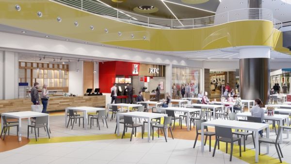 Nuovo ristorante KFC a Pontecagnano, Campania. Interni con tavoli e clienti. KFC Italia, pollo fritto.
