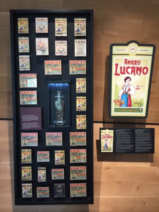 Amaro Lucano: esposizione storica etichette e bottiglia. Singapore.