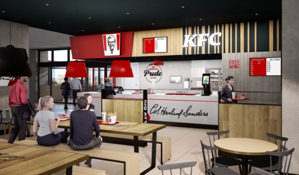 Interni del ristorante KFC a Cagliari. Casse, tavoli e clienti. KFC Sardegna.